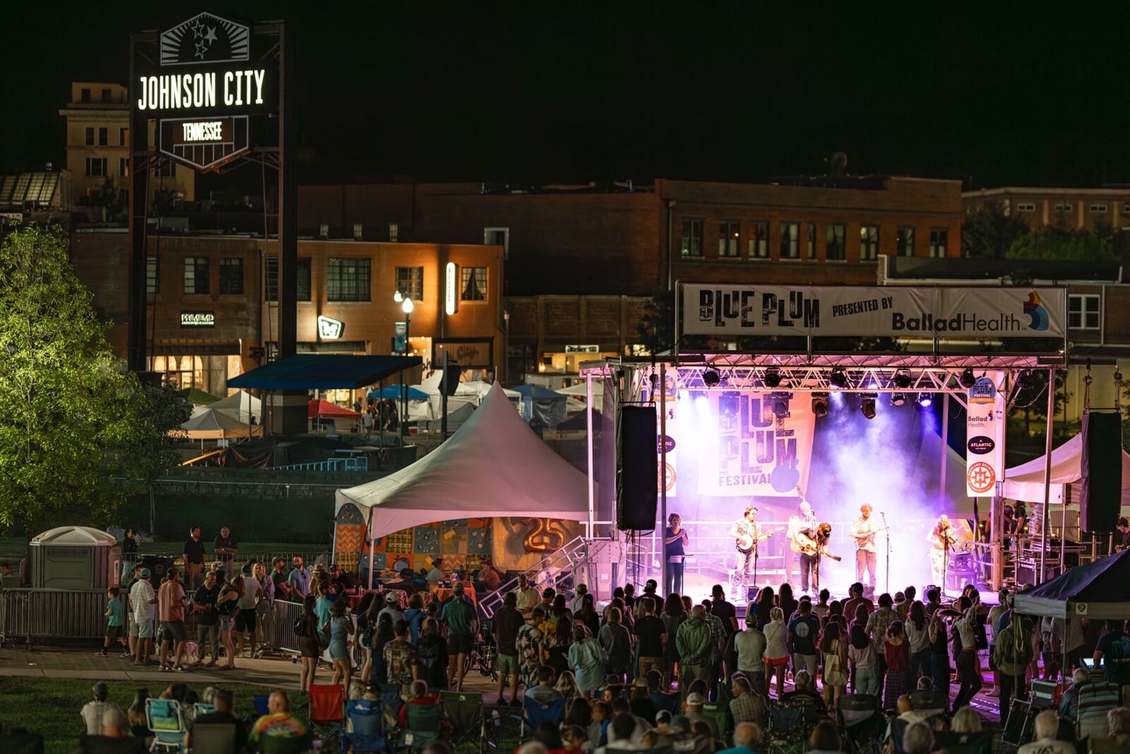 A night crowd at the Blue Plum Festival stage in downtown Johnson City, Tennessee