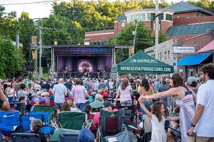 A festival crowd filling a downtown street at Boonerang Music & Art Festival in Boone, North Carolina