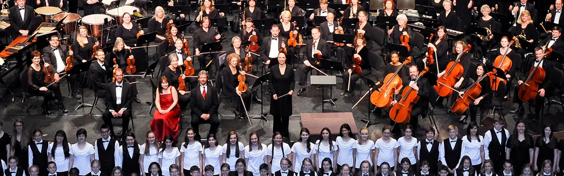Symphony of the Mountains performing with a choir